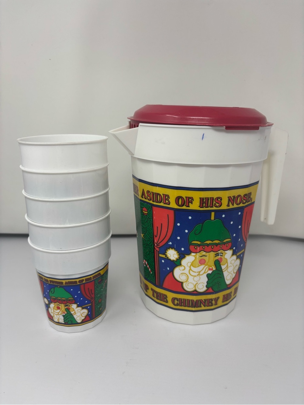 Festive Santa Plastic Pitcher and Stackable Cups - White & Red, vintage
